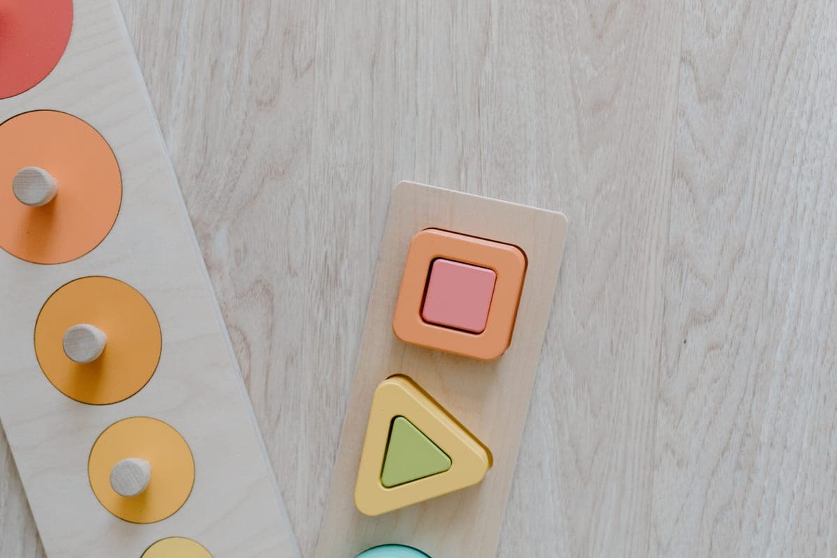 Montessori wooden toys arranged on a shelf